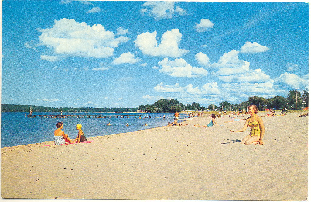 People playing at West Bay Public Pier and Beach at Traverse City