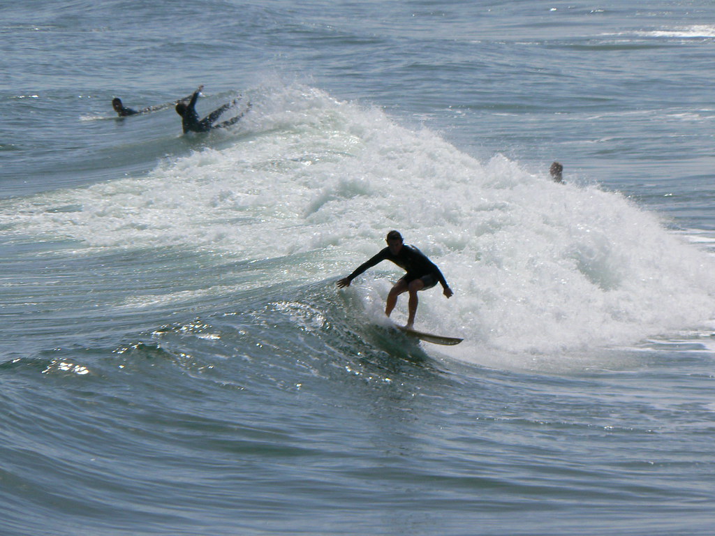 Surfer at beach in Jacksonville Beach, Florida