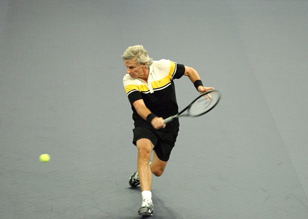 Bjorn Borg returns a shot against John McEnroe during an exhibition tennis match in Showdown of Champions