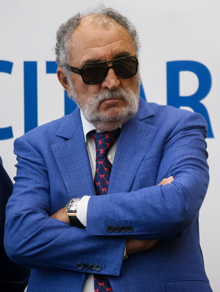 Ion Tiriac listening to the Wimbledon women's singles tennis champion Simona Halep speech at Henri Coanda Airport