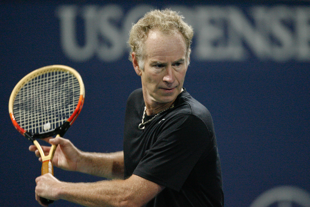 John McEnroe play a charity match at the Farmers Classic