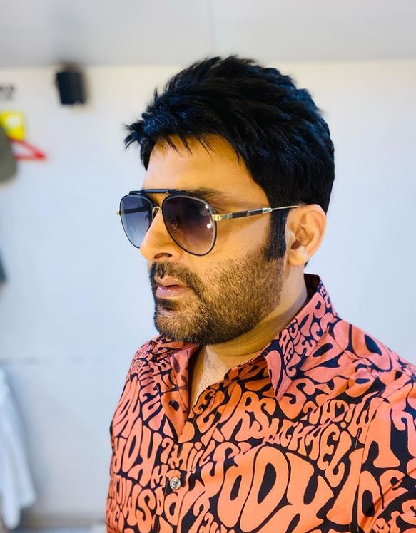 Kapil Sharma in sunglasses and patterned top