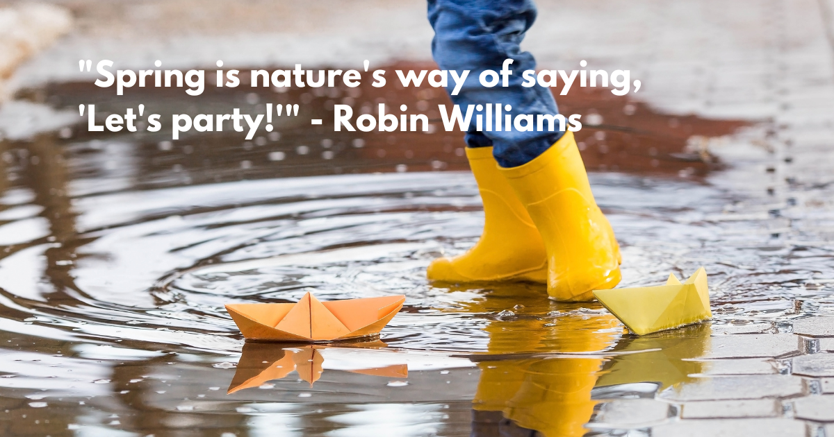 It's springtime. A small child in yellow rubber boots jumps through puddles, plays and launches paper boats on the water.. Photo of spring and autumn holidays. The concept of spring.