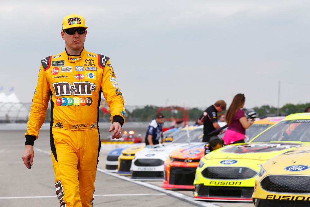 Kyle Busch hangs out on pit road before qualifying for the FireKeepers Casino 400