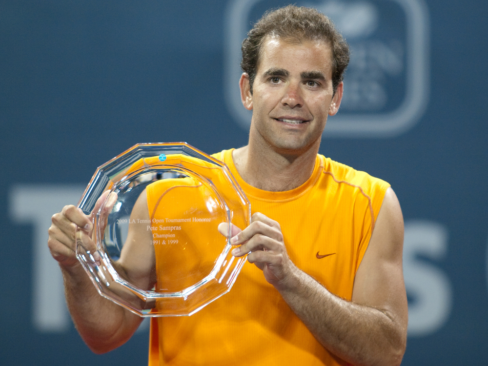 Pete Sampras recieves award after an exhibition match at the L.A. Tennis Open