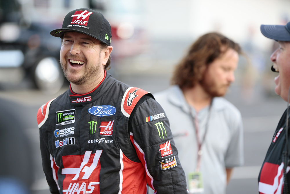 Kurt Busch hangs out on the grid before qualifying for the Coca Cola 600