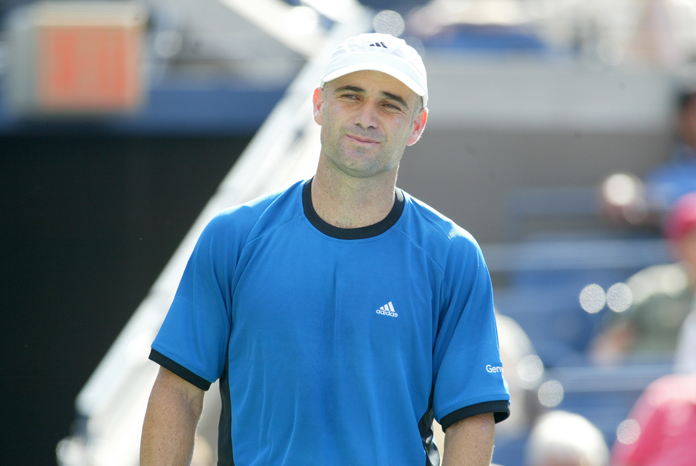 ndre Agassi stands during his match against Ivo Karlovic in the second round of the US Open
