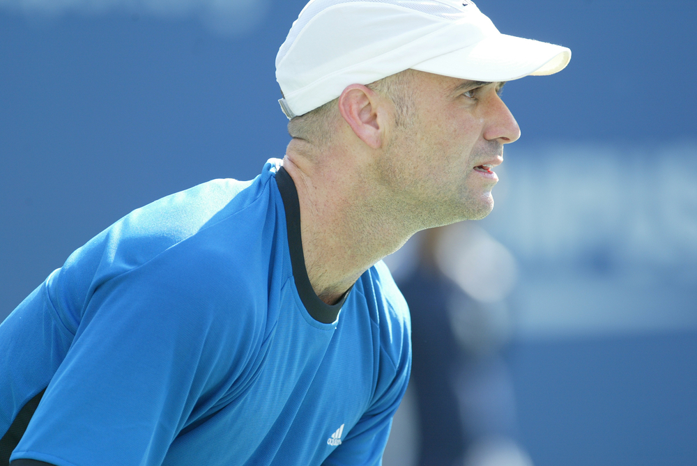 Andre Agassi plays against Ivo Karlovic in the second round of the US Open