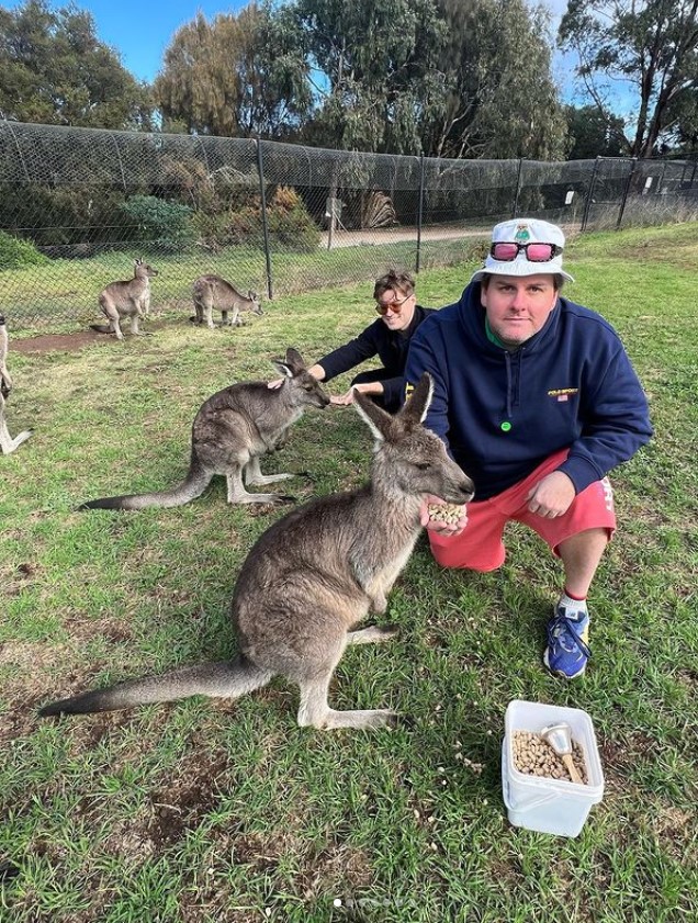 Tim Dillon outside with kangaroos